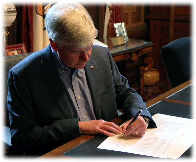 Gov. Synder Signing a Michigan Marijuana Law info effect